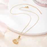 Style Gold-Plated Rhinestone Bow Pendant Necklace – Fashion Jewelry for Women